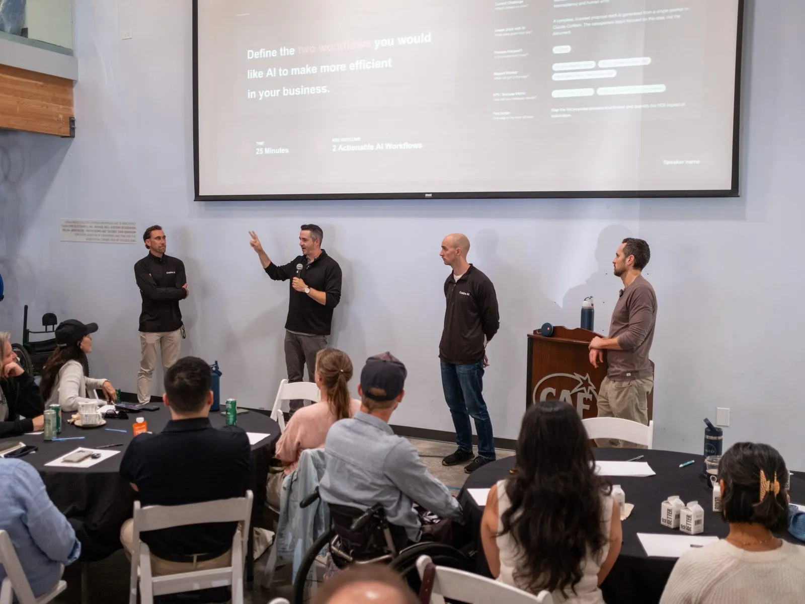 Cadre AI training session on stage